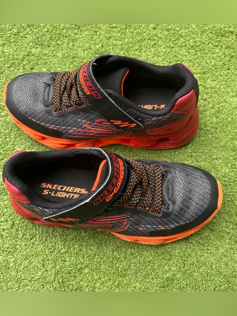 Skechers Kids Black and Orange Light-Up Sneakers